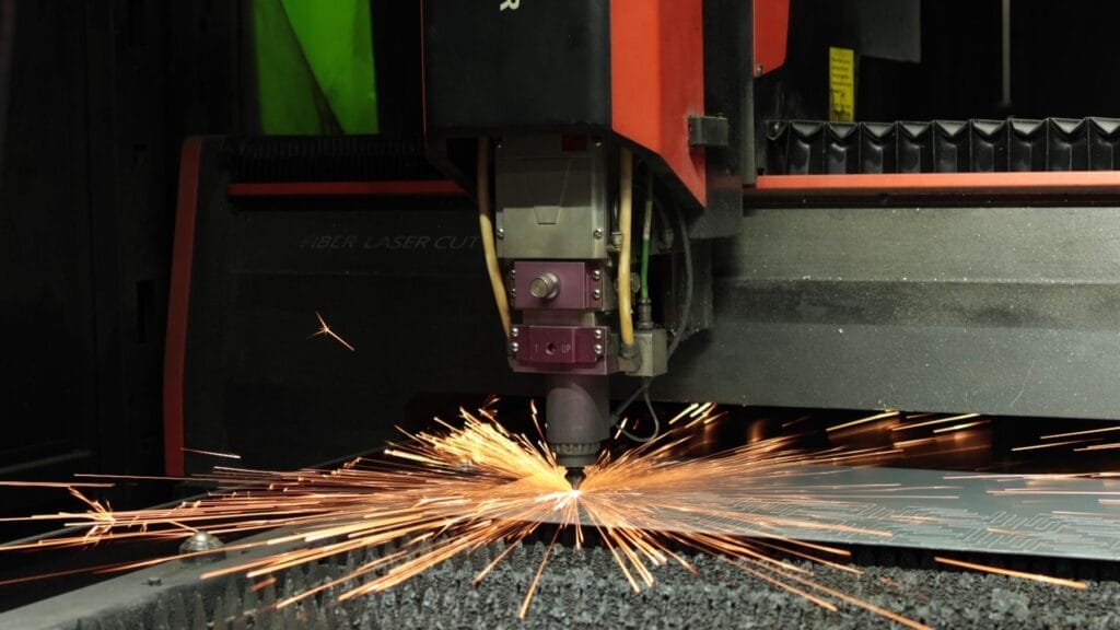 fiber laser cutting machine steel sheet sparks dark