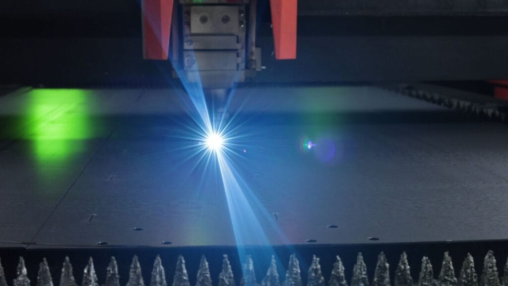 fiber laser cutting steel sheet blue beam sparks