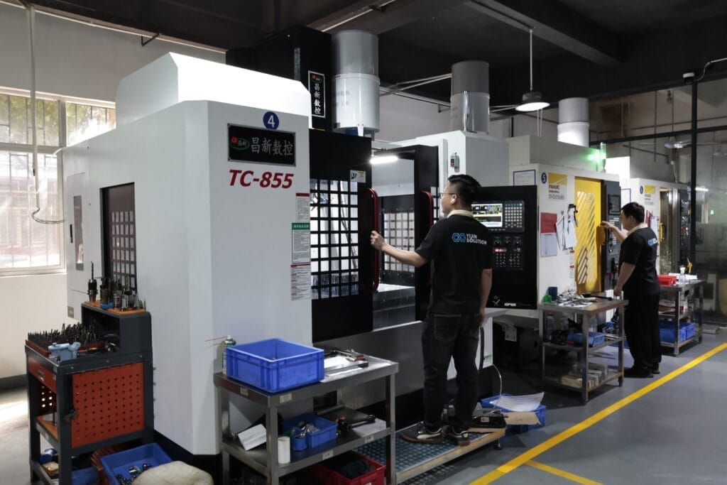 tc855 cnc machining center with operator
