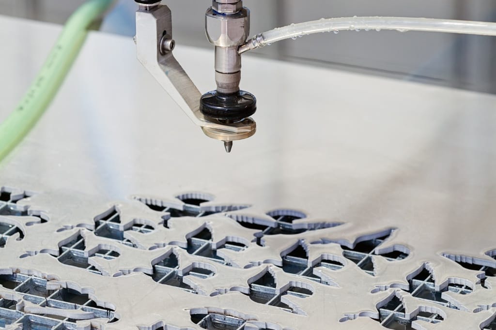 the benefits of 5 axis waterjet cutting systems